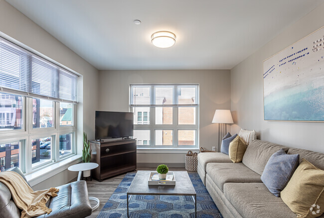 2BR, 1.5BA Type F- Living Room - Soundview Landing