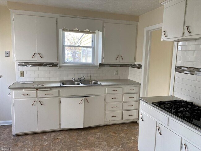 Foto del edificio - 5213 E 119th St