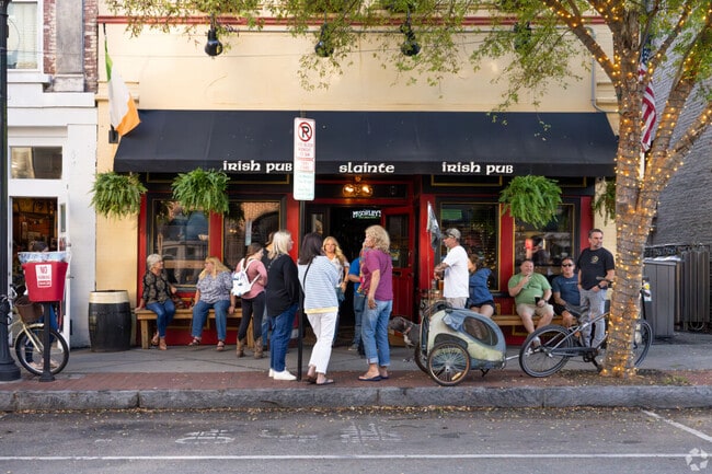 In Wimington along Front Street, tourists and residents pour in and out of bars, breweries.