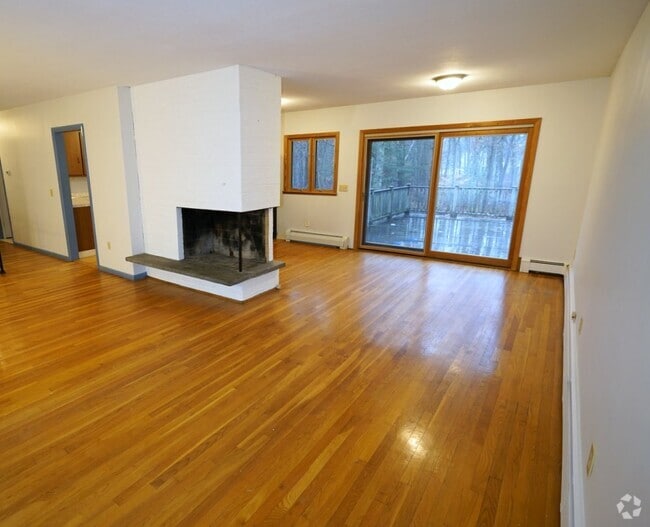 Living Room and Dining Room with sliding door to large private deck - 208 Grove St