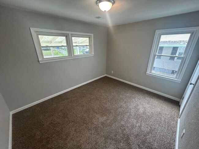 Building Photo - New 4 bedroom, 2 bathroom home for rent in...