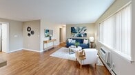 Located at 41 Marshall Rd, Unit 22A in Rocky Hill, CT, this one-bedroom, one-bathroom residence offers a well-designed single-floor layout with a thoughtful mix of comfort and functionality. The living room is generously proportioned, featuring warm hardwood flooring, neutral-toned walls, and multiple windows that draw in abundant natural light, creating an open and inviting atmosphere. The kitchen is efficiently laid out with white cabinetry, granite countertops, stainless steel appliances including a range, dishwasher, and refrigerator, as well as hardwood flooring and a window over the sink. A hallway connects the main living areas to the private quarters. The spacious primary bedroom is carpeted for comfort and benefits from two windows that provide ample natural light and outdoor views. Two white bi-fold closet doors offer generous storage. The full bathroom features hardwood flooring, a white vanity with a large mirror, and a tub-shower combination with a window for natural ventilation. Throughout the residence, a cohesive neutral color palette and consistent finishes create a clean, comfortable living environment.