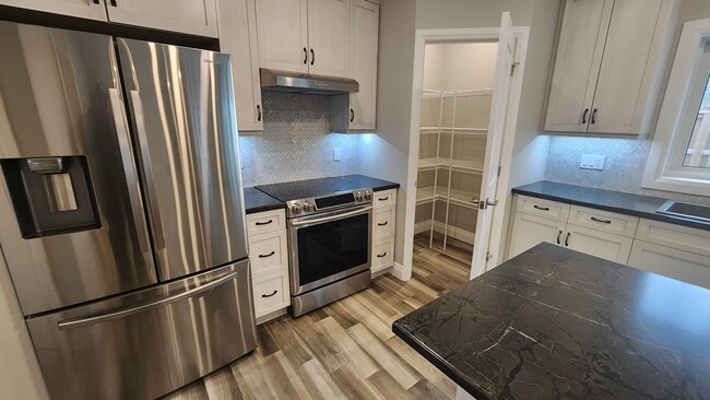 Stainless Stove and Fridge with Pantry - 300 Walnut St