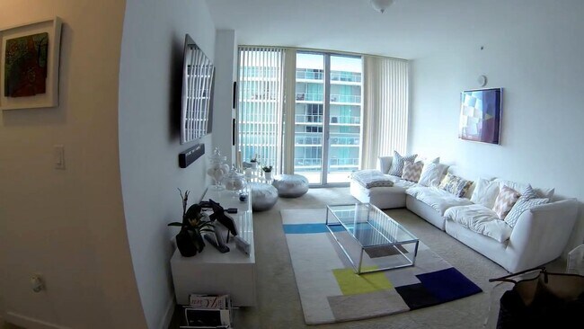 Large and bright living room with terrific access to balcony ! - 79 SW 12th St