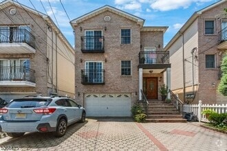 Building Photo - 401-403 E Kinney Street Unit