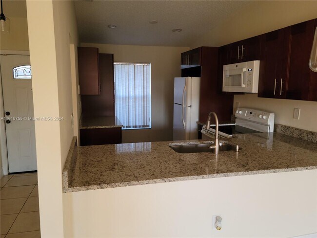 Building Photo - 9340 E Daffodil Ln