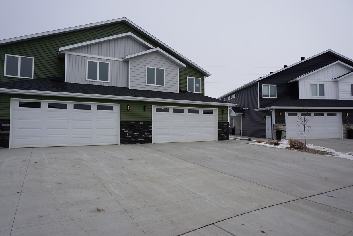 Large driveway and two stall extra large garage (Photos are of similar unit with similar finishes.) - 3811 Stacy Drive