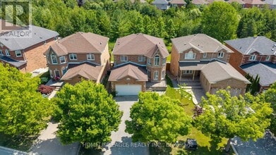 Building Photo - 63 Raintree Crescent