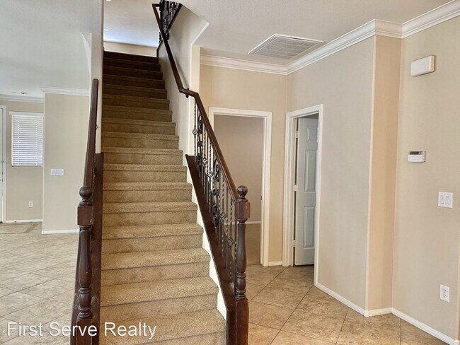 Building Photo - 4 br, 2.5 bath House - 6557 Cape Petrel St.