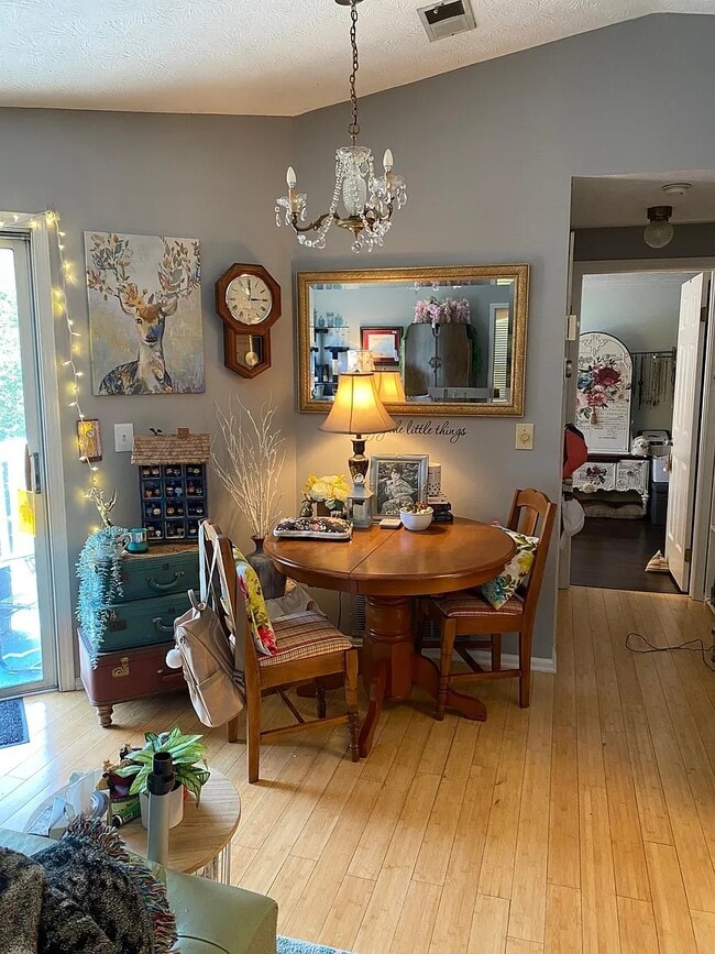 There's a small eating area as part of the living room - 1483 Keys Crossing Dr NE