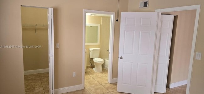 Building Photo - 9491 Palm Cir S