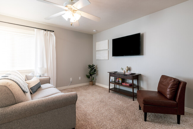 Living room with pullout sofa and smart tv - 406 Neff Cir