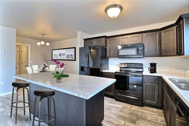 Building Photo - Stunning 2-Story Twin Home in Vibrant Lake...