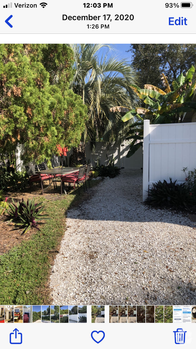 The shell driveway and pathway takes you to your gated entrance. - 5703 Murdock Ave