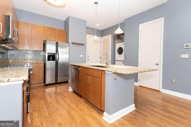 Building Photo - 711 Cosmopolitan Dr NE