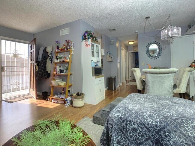 Building Photo - Adorable Upper Unit Condo with 1 Car Garage!