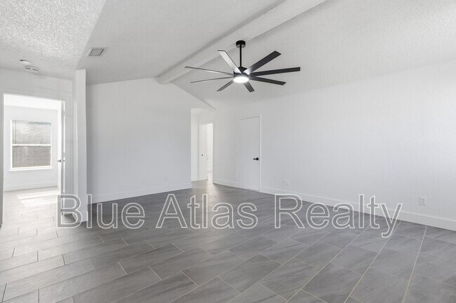 Building Photo - 7124 Wagonwheel Rd