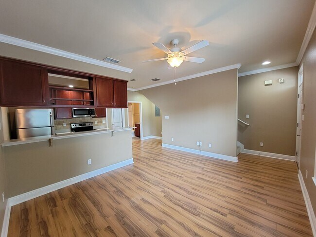 Building Photo - 3 Bedroom town home for rent August 6, 2026 in gated community with pool, renting for $1550 per m...