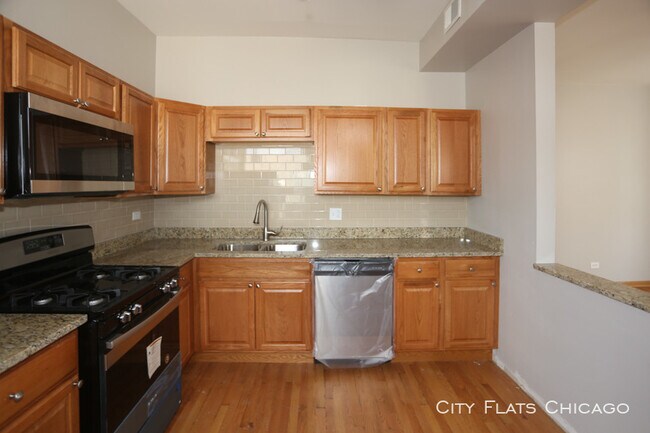 Foto del edificio - 1052 N Oakley Blvd