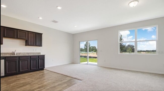 Fenced in private back patio with plenty of sunlight - 657 Madison Dr