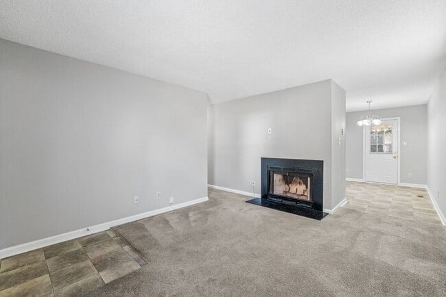 Building Photo - NE Home - Updated Kitchen and Bathrooms! SS Appliances, Fire Place, Front Porch & Deck, Fenced Yard!