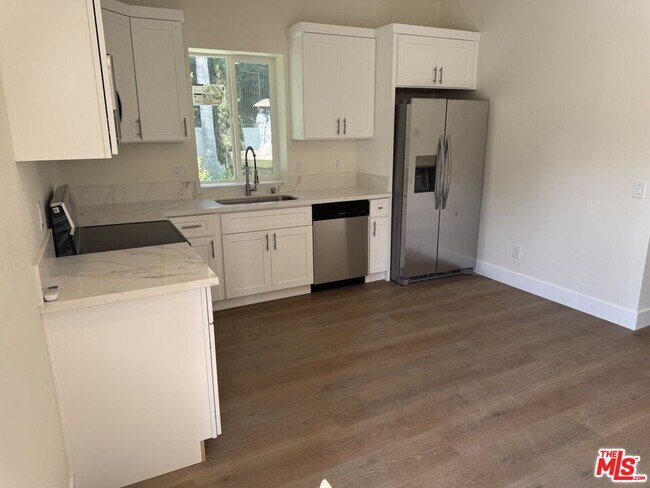 Foto del edificio - 4608 Whispering Woods Ct