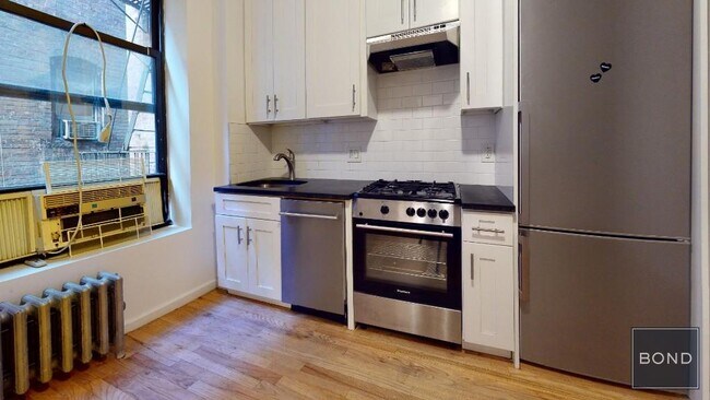 Foto del edificio - 419 E 73rd St