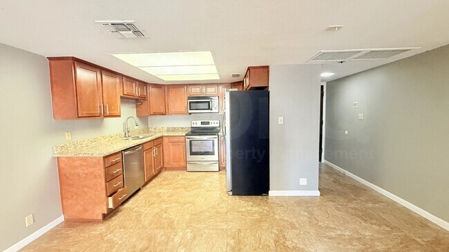 Building Photo - 7910 E Camelback Rd