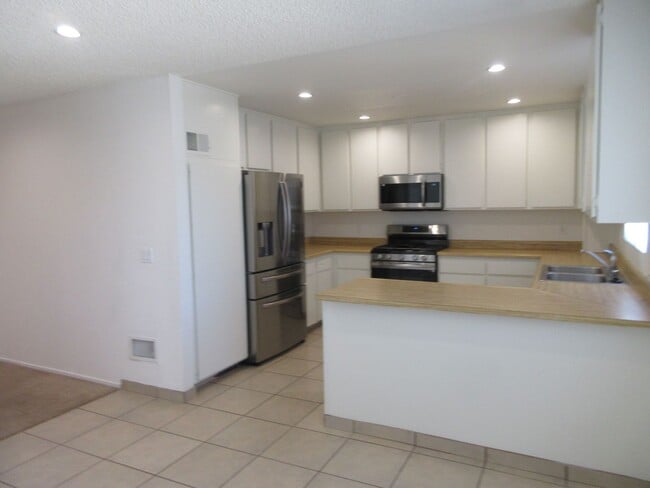 Building Photo - Duggan Property Management, Inc presents  Canoga Park - 3 Bedroom 2.5 Bath