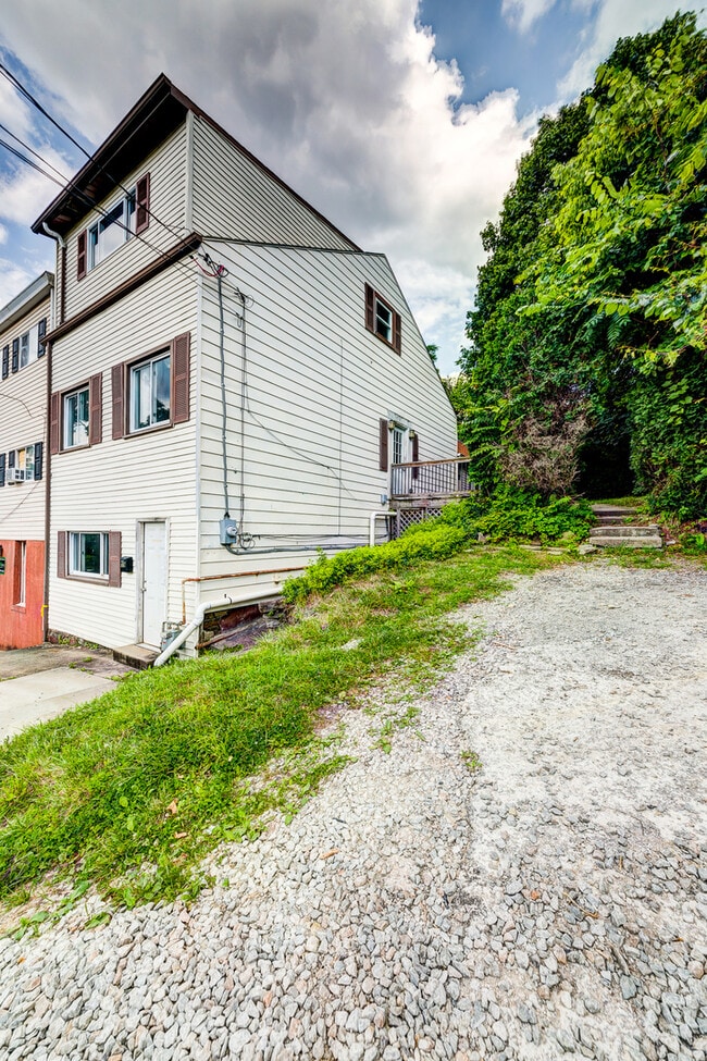 Photo - AVAILABLE AUGUST 2026 - Beautiful 3 Bedroom Home w/ OFF-STREET PARKING & Deck!