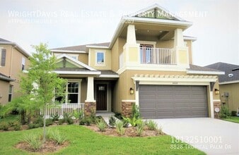 Building Photo - 8828 Tropical Palm Dr