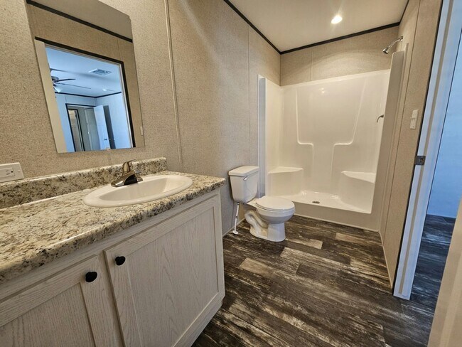 Building Photo - 6631 Hidden Oaks Dr