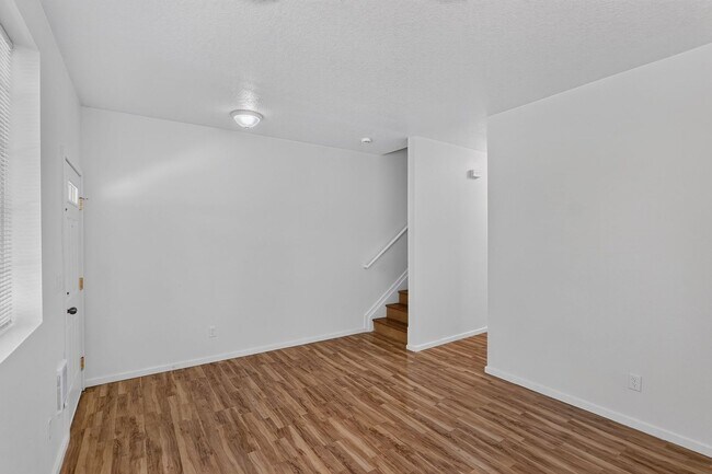 Building Photo - Bright & Spacious Townhome with Private Patio