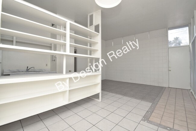 Building Photo - Sun-Drenched Mid-Century Living Near Garden District