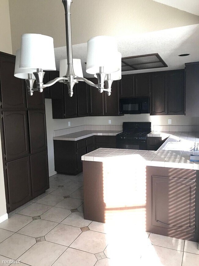 Foto del edificio - 4 br, 3 bath House - 8132 Rockbury Way