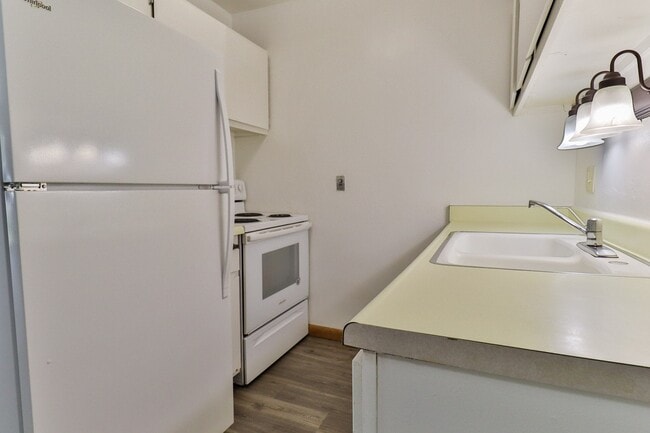 Kitchen Featuring Full Size Appliances - Alverno Pool Apartments
