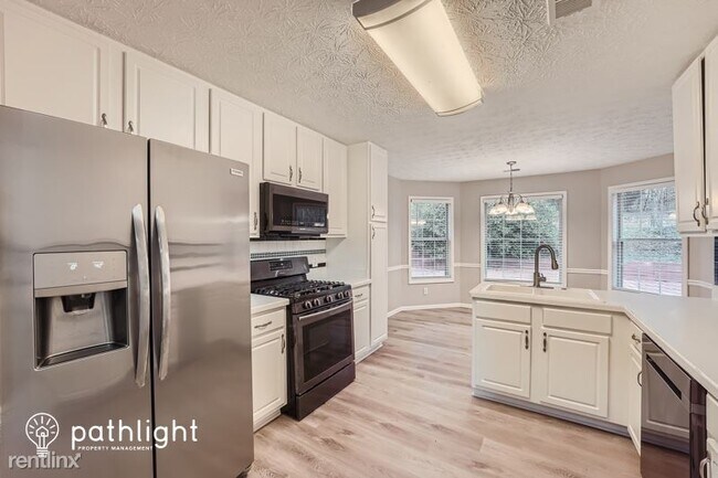 Foto del edificio - 4 br, 2 bath House - 2002 Flowering Dr UNIT