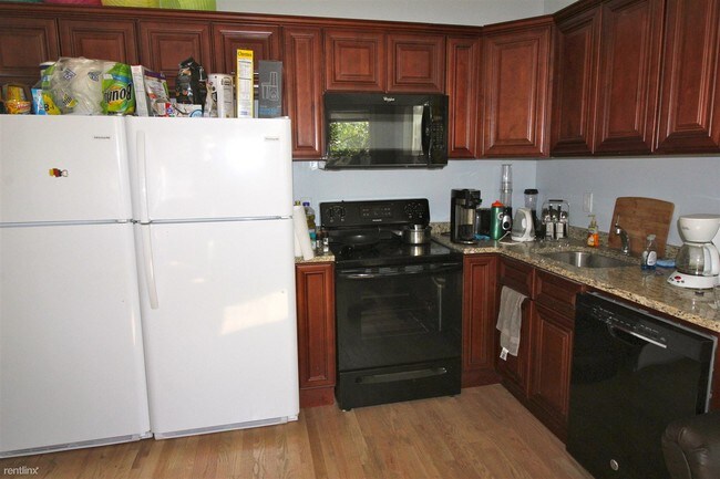 Foto del edificio - 4 br, 2 bath  - 410 S Division St Apt 1 #1