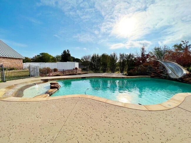 Building Photo - Gated 3-Story 4/4/3 Nestled on Over an Acr...
