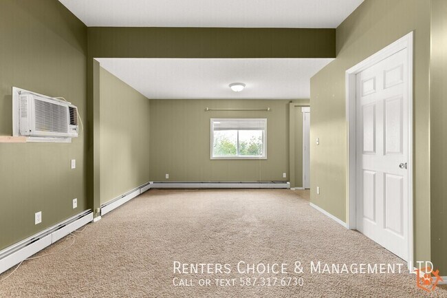 Photo du bâtiment - Main Floor 2 bedroom Unit With Onsite laundry, BONUS INCENTIVE