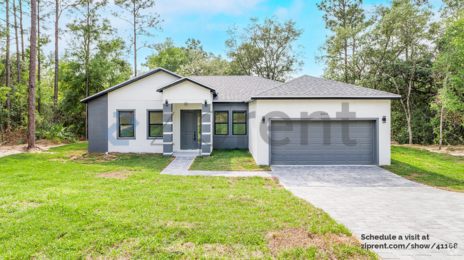 Building Photo - 8202 N Triana Dr