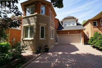 Building Photo - 4887 Natkarni Crescent