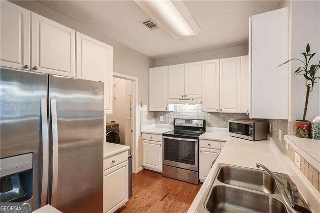Foto del edificio - 5103 Woodland Ln