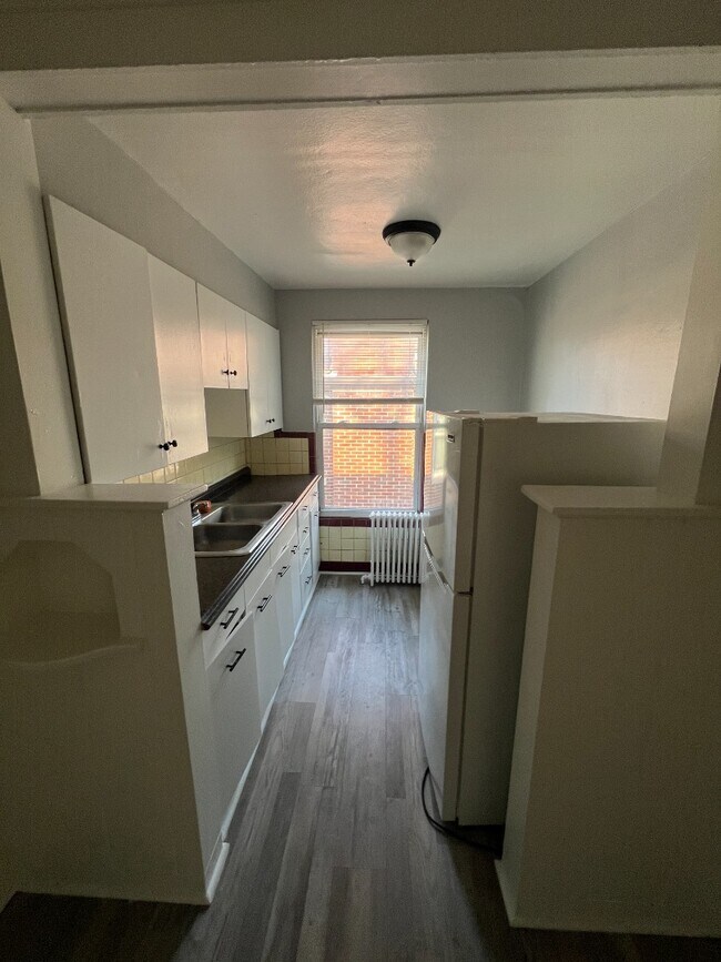 Photo - Spacious, Newly Updated 1-Bed Near UC & Downtown — Off-Street Parking, Radiant Heat Apartment