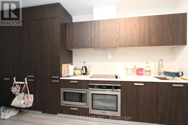 Photo du bâtiment - 50 Charles St E