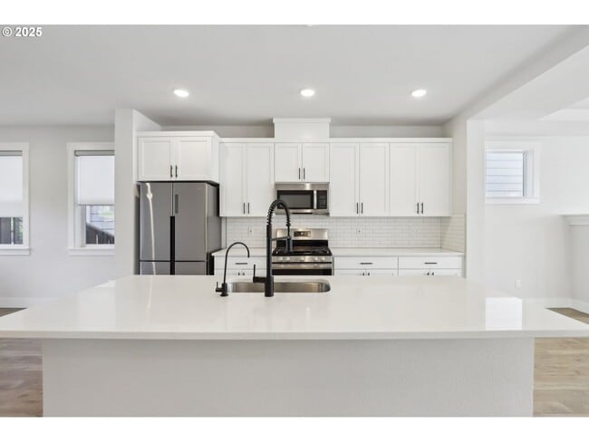 Building Photo - Modern 4-Bedroom Home with Upgraded Finish...