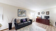 Located at 905 South Ave in Rochester, NY, this 2-bedroom, 1-bathroom unit offers a well-organized single-floor layout designed for comfortable everyday living. The living room is bright and welcoming, featuring light wood-style flooring, neutral walls, and a window that allows natural light to fill the space. The adjacent area flows into a hallway that connects the key rooms throughout the unit. The kitchen is efficiently laid out with white cabinetry, dark laminate countertops, a gas range, and a window overlooking the outdoors, providing both functionality and natural light. Two carpeted bedrooms offer a quiet retreat, each with windows fitted with blinds that provide natural light and privacy. The primary bedroom provides a comfortable amount of space, while the second bedroom is well-suited for a guest room, home office, or additional living needs. The bathroom is clean and straightforward, featuring a single vanity with under-cabinet storage and a medicine cabinet mirror. A hallway connects the main living areas to the private spaces, contributing to the unit's practical and efficient flow. The light-toned walls and wood-style flooring in the common areas give the space a cohesive, understated aesthetic throughout.