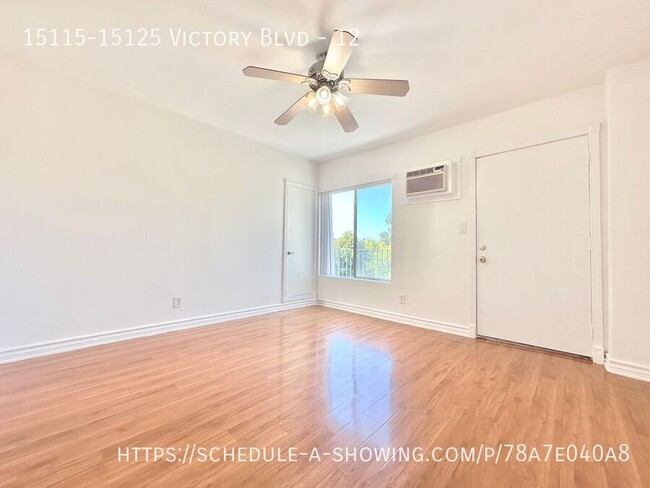 Building Photo - Updated top floor Studio apartment located...