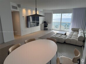 Building Photo - 10275 Collins Ave