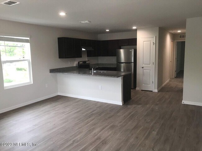 Building Photo - 7656 Mailes Ct